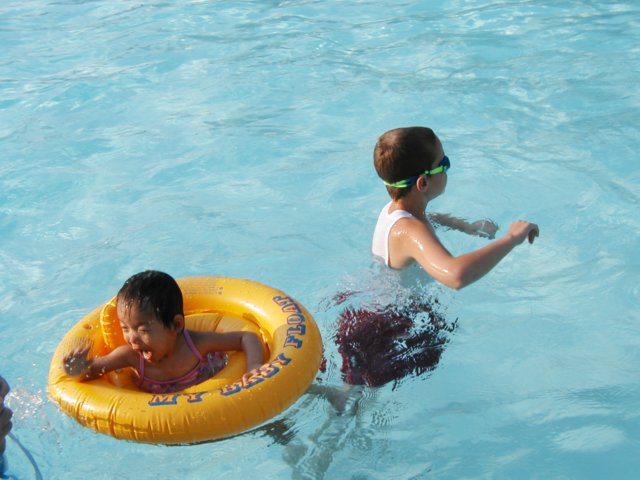 swimmingatthepoolwithunclepaulandjacob.jpg